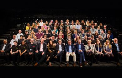 A photo of all employees of Curve seated in the Studio Theatre