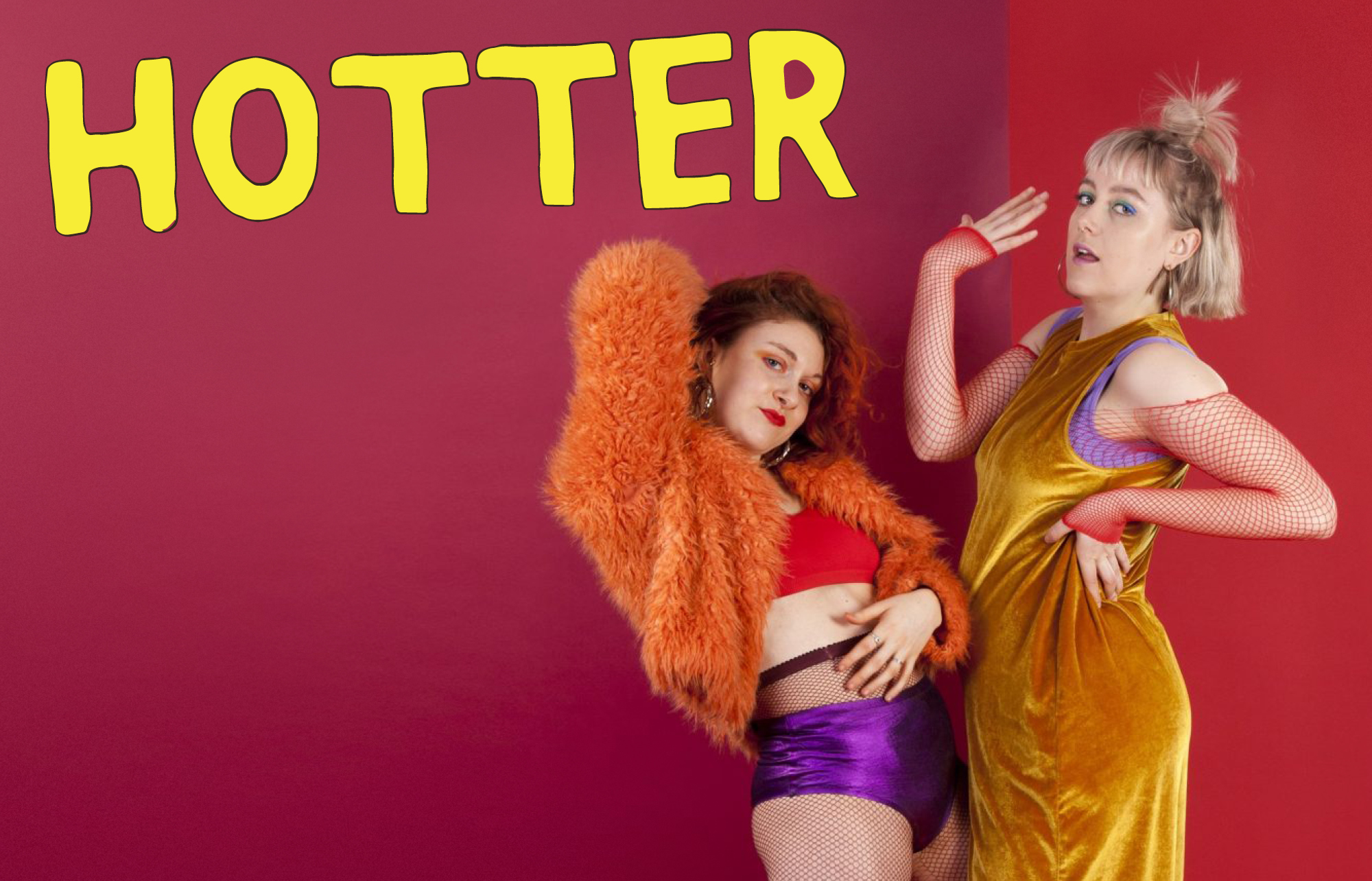 Ell and Mary pose against a red background wearing an array of colourful, textured clothing. Yellow text reads HOTTER in the top left corner.