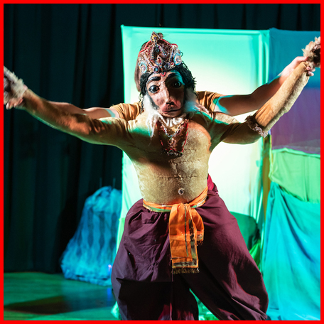 A production image from Hanuman Tales depicting the Hanuman puppet with arms open.