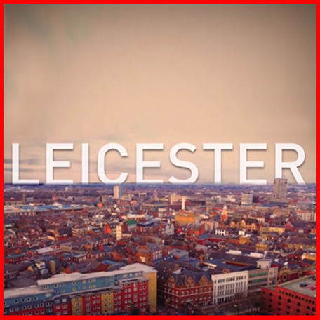 A birds-eye view of Leicester City Centre with the word LEICESTER written across the horizon in white capitals.