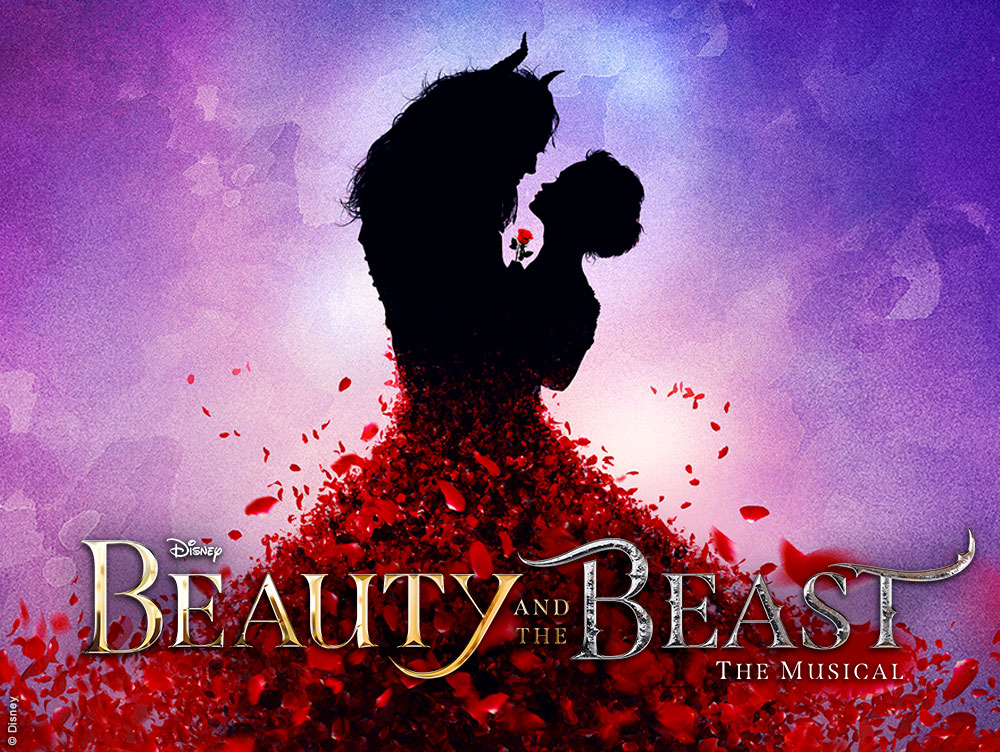 Promotional artwork for Beauty and the Beast. Belle and the Beast embrace in silhouette holding a red rose, against a blue and purple toned background. Red rose petals cascade from their waists. Text: Disney, Beauty and the Beast, The Musical.